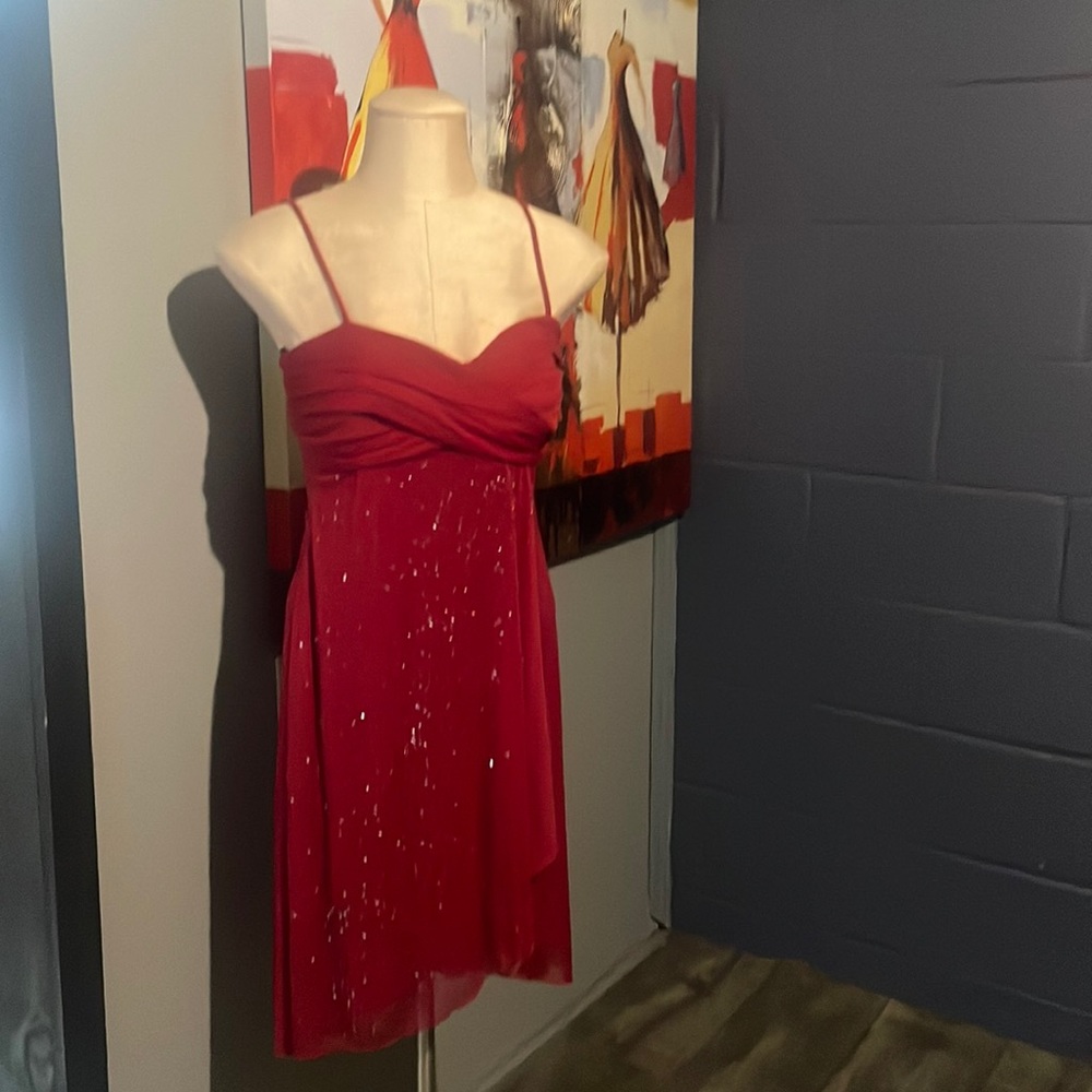 Red mini dress with sequins detail on the front